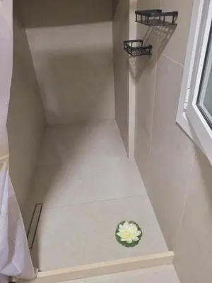 a staircase with a flower on the floor at Sebastian Luxury House in Rhodes Town