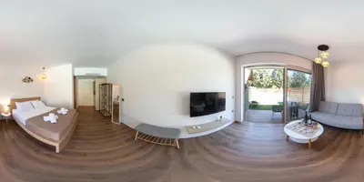 a large living room with a large white room at M&B Luxury Suites Charaki in Haraki
