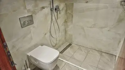 a bathroom with a shower and a toilet at Villa Sephora in Faliraki