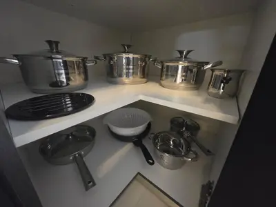 a kitchen with pots and pans on a shelf at Konnet Apartment #2 in Rhodes Town