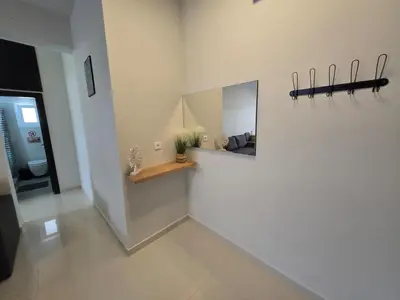 a room with a mirror on the wall at Konnet Apartment #2 in Rhodes Town