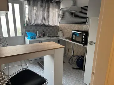 a kitchen with a sink and a microwave at rosi rhodos in Rhodes Town