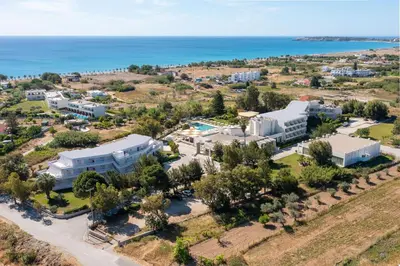 an aerial view of the resort and the ocean at Afandou Bay Village Resort Hotel in Afantou
