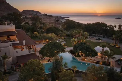 an aerial view of a resort with a swimming pool at Palazzo Navarone in Líndos