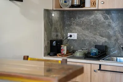 a kitchen with a sink and a counter top at Vavana Studios in Symi