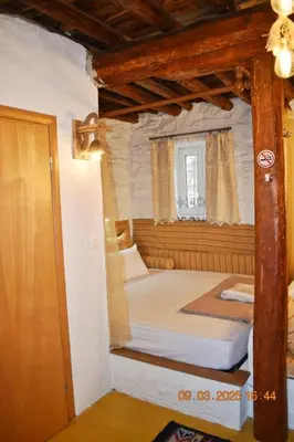 a bedroom with two bunk beds in a room at Mannas House 2 in Émbonas