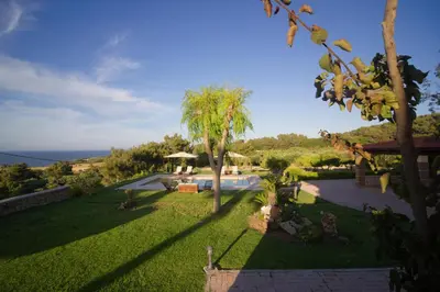 a view of a yard with a swimming pool at Villa Russelia in Kalavárda