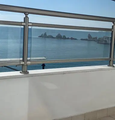a view of the ocean from a window of a building at Haraki style studio in Haraki