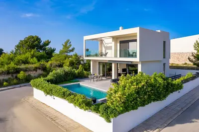 an image of a house with a swimming pool at Sunset Villa Rhodes in Ixia