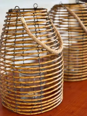 two wicker baskets sitting on top of a wooden table at Rodosia Apartment IN Rhodes in Rhodes Town