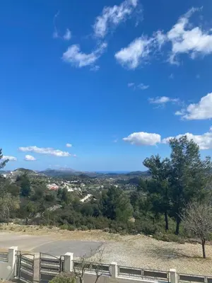 a view of a parking lot with a blue sky at Serenity Escape in Nísos Ródos