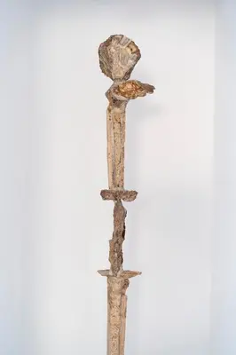 a wooden pole with a rock on top of it at Peaceful Lindos in Líndos