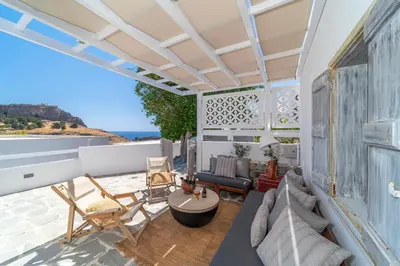 a house with a view of the ocean at Peaceful Lindos in Líndos