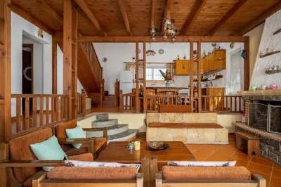 a living room with a couch and a table at Yannis Place in Rhodes Town