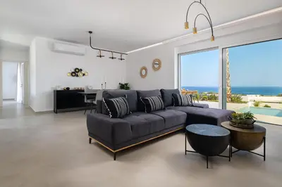 a large living room with a couch and a table at Luxurious Villa with sea views in Gennadi Rhodes in Gennadi