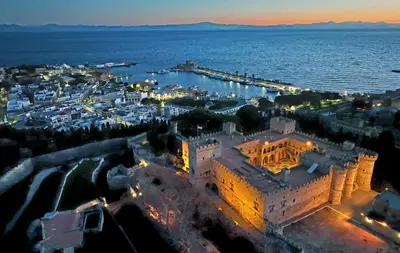 an aerial view of a city at night at Dora 3 bedroom apartment in Rhodes Town