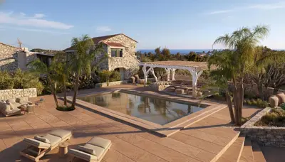 a villa with a swimming pool and a house at Villa Oasis 3 in Kalithies