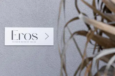a sign that reads ellos hanging on a wall at Eros Elysium Retreat Villas in Kalavárda