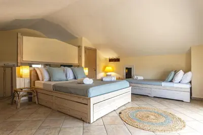a bedroom with two beds in a room at Mi Casa South Rhodes in Lachania