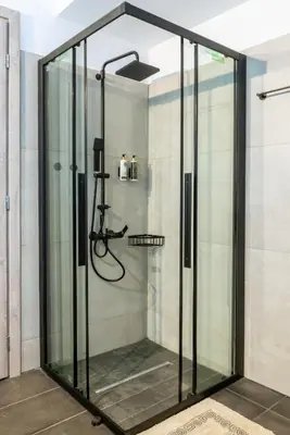 a shower with a glass door in a bathroom at La casa di pantelis with Luxury Pool in Archangelos
