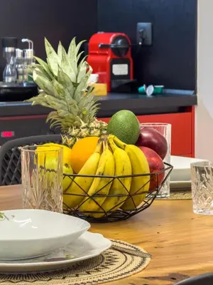 a bowl of fruit sitting on a table at La casa di pantelis with Luxury Pool in Archangelos