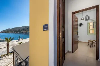 a hallway with a view of the ocean at Agkyra Studio in Symi