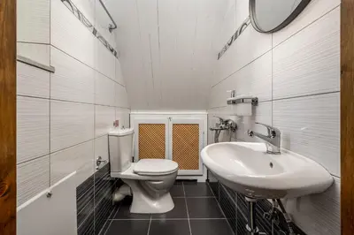 a bathroom with a toilet and a sink at Agkyra Studio in Symi
