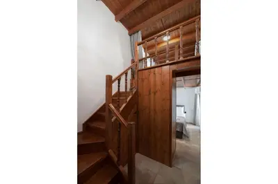 a staircase leading to the second floor of a house at Casa della Nonna Rhodes in Gennadi