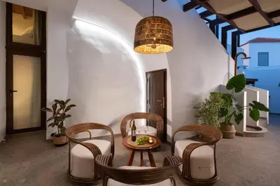 a room with a table and chairs and a ceiling at Casa della Nonna Rhodes in Gennadi