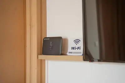 a tv sitting on a shelf next to a box at Casa Di Kritinia in Kritinía