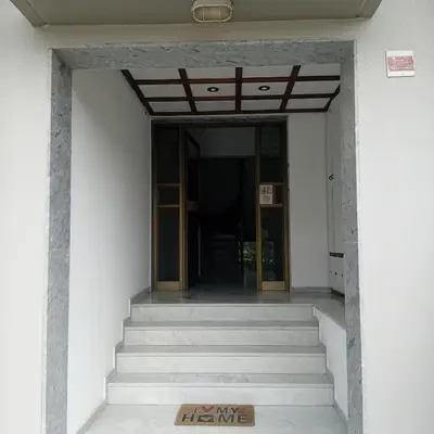 an entrance to a building with stairs and a door at Dioni of Rhodes in Rhodes Town