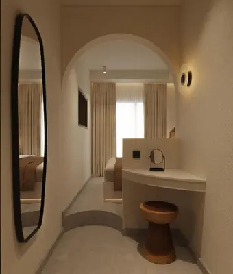 a bathroom with a mirror and a toilet and a sink at néreya luxury rooms in Haraki