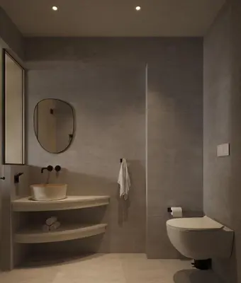 a bathroom with a sink and a toilet and a mirror at néreya luxury rooms in Haraki