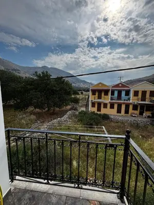 a view from the balcony of a house at Amelia's Home in Symi