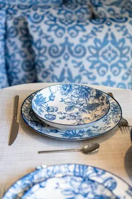 two blue and white plates sitting on a table at Cozy Suite in Rhodes Town