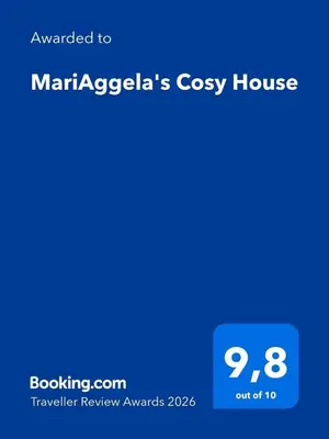 a screenshot of a cell phone with the text upgraded to marigotas cozy at MariAggela's Cosy House in Theologos