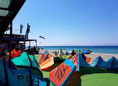 a group of colorful kites on the beach at Sunset Beach Studio in Kremasti