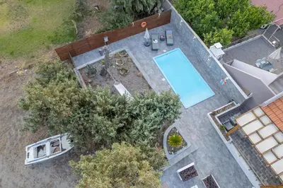 an overhead view of a swimming pool in a backyard at Villa Perla in Lardos