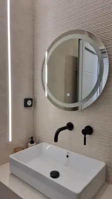 a bathroom sink with a large mirror above it at Sulaj Apartments in Faliraki