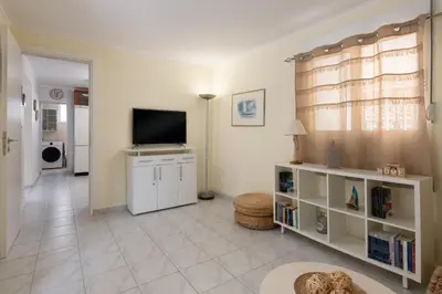 a living room with a flat screen tv and a living room at Rhodes Garden Retreat in Rhodes Town
