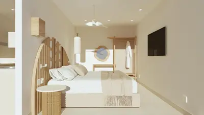 a bedroom with a bed and a table at Centro Blu Luxury Apartment in Rhodes Town