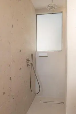 a shower in a bathroom with a window at MelMar Aegean Harmony in Faliraki