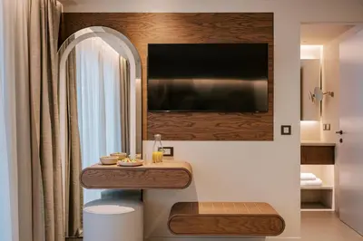 a bathroom with a sink and a mirror at Cento Palme in Rhodes Town