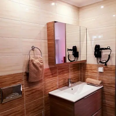 a bathroom with a sink and a mirror at Estrella Villas in Lardos