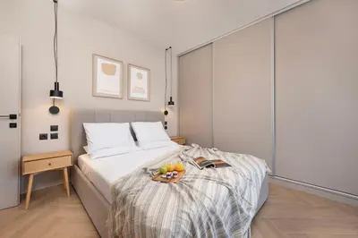 a bedroom with a bed with a bowl of fruit on it at Dolce Casa Suite2 in Afantou