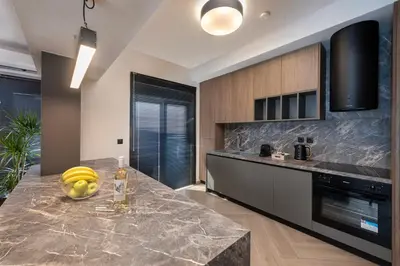 a kitchen with a counter with bananas on it at Dolce Casa Suite2 in Afantou