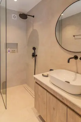 a bathroom with a sink and a shower at Antonis Traditional House in Afantou