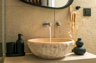 a bathroom with a bowl sink with a faucet at Villa Mare Mio, beachfront, newly rennovated in Lachania