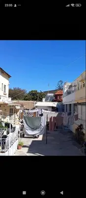 a view of a balcony with clothes hanging on a fence at Caserma Regina in Rhodes Town