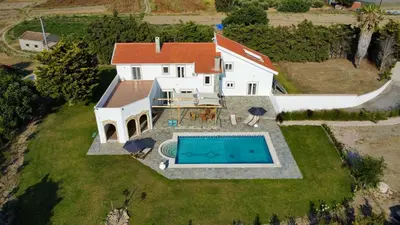 an aerial view of a house with a swimming pool at Villa Eos in Kalavárda